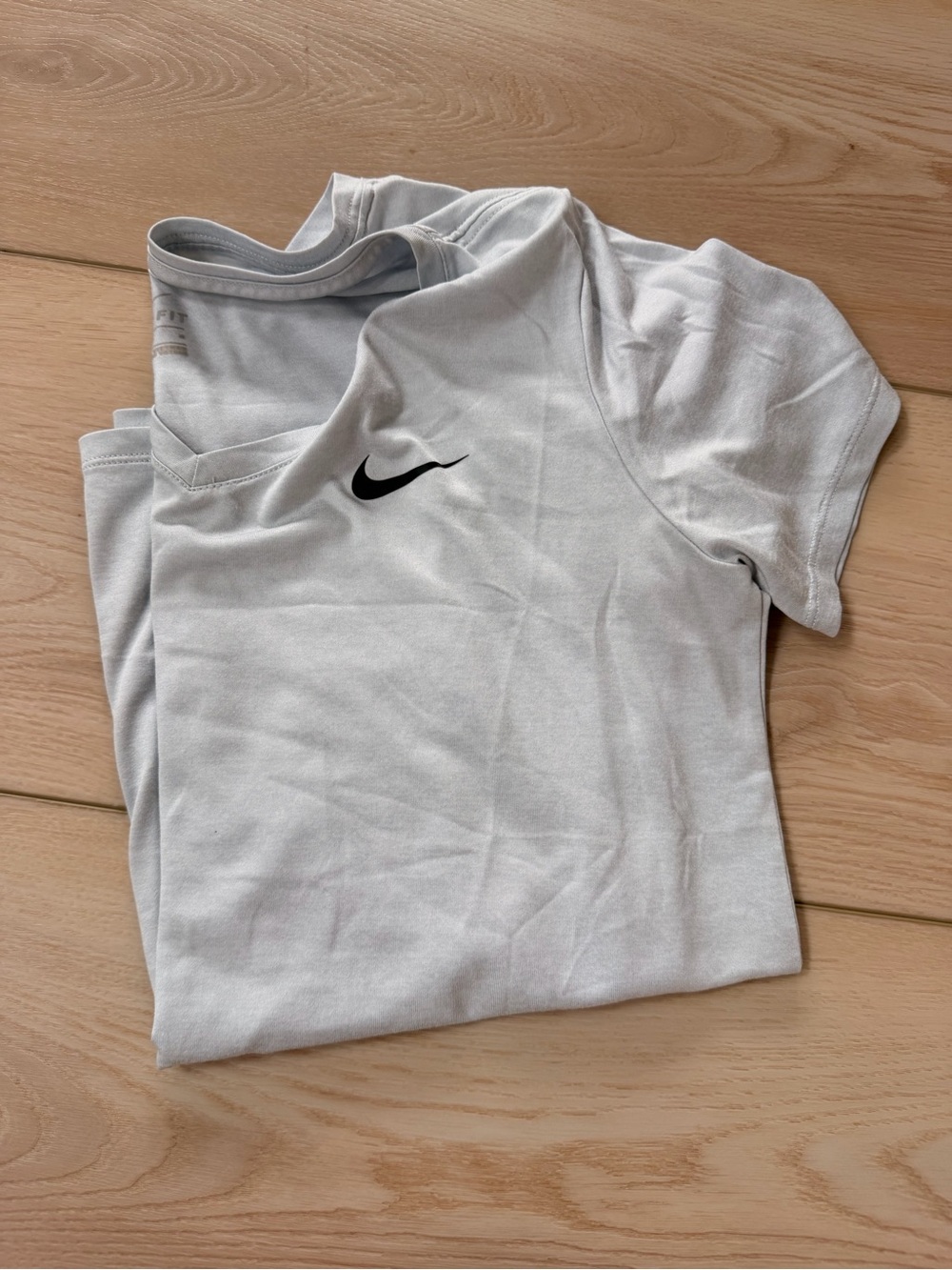 Nike Grey Womens Short-Sleeve Athletic Tee with Black Swoosh
